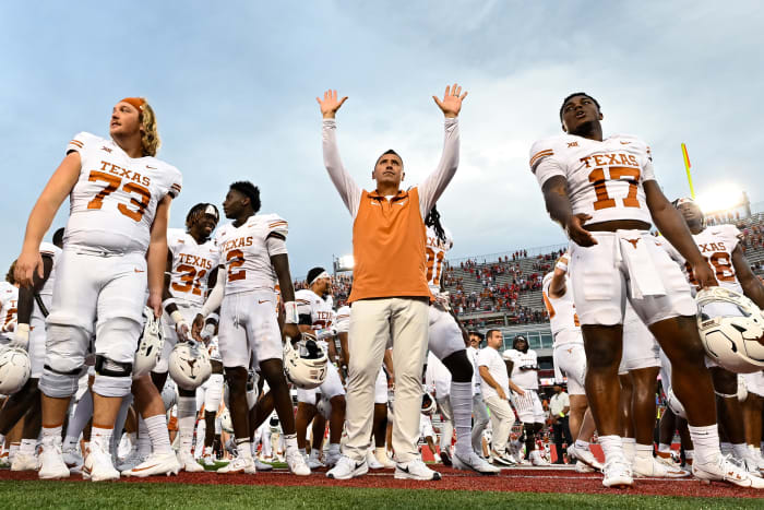 Texas Longhorns Steve Sarkisian celebrates a victory over Houston at TDECU Stadum in Houston, Texas.
